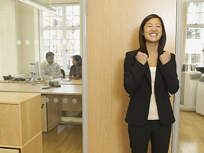 Asian businesswoman cheering