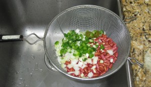 Rinse and drain the beans.  I like to toss the veggies into the strainer.