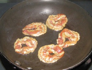 Fry bacon or Pancetta until crisp; drain on paper towel