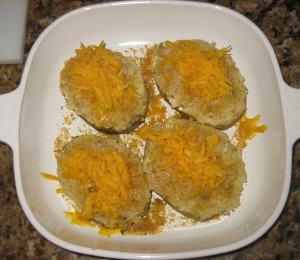 Arrange cheddar cheese over each potato half and return to oven until the cheese is melted