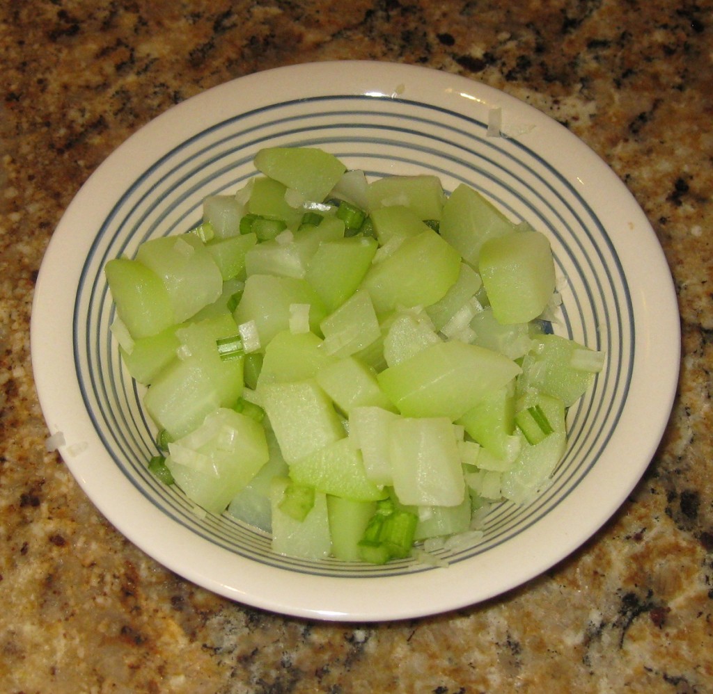 Chayote chunks boiled, fork tender and ready to go!